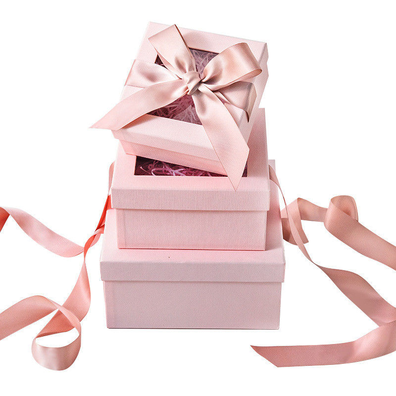 Kundengebundene rosa Geschenkbox Quadrat Recentage mit Band